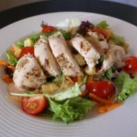 Ensalada de Pollo · Chicken Salad. Grilled chicken breast, chopped fresh lettuce, tomatoes, onions, croutons and...