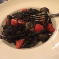 390490. Squid Ink · Squid, tomato and onion in squid ink sauce.