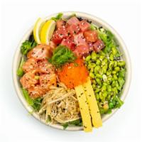 Sakura Salad · Salmon, ahi tuna, tamago, enoki mushrooms, edamame, Tobiko, lemon, street crunch, green onio...