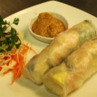 7. Fresh Roll · 2 pieces. Romaine lettuce, cucumber, carrots and shrimp wrapped in rice-paper. Served with p...
