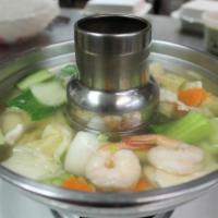 204. Wonton Soup · Chicken, shrimp, Chinese cabbage and bok choy stuffed ground chicken in chicken broth.