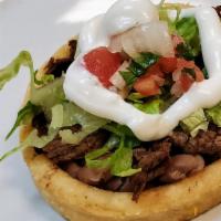 Three Sopes Plate · 3 sopes, Choice of Meat , Beans, Lettuce, sour cream and Pico de Gallo.