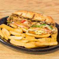 Steak & cheese Sub · Served with onions, provolone cheese, lettuce, tomatoes, mayonnaise, grilled peppers,  .