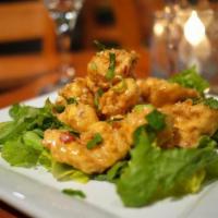 AppeThaizing Shrimp · Shrimp lightly fried to perfection, tossed with spicy cream sauce, garnished with sesame see...