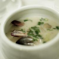 Tom Kha Soup · Coconut and galangal soup. Coconut milk, galangal and lemon grass broth flavored with lemon ...