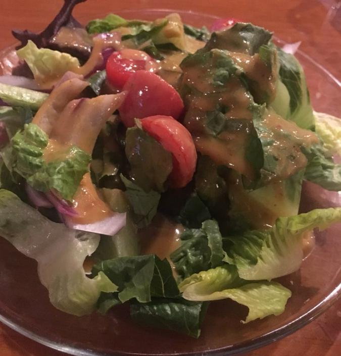 Mixed Greens Salad · Mixed greens with tomatoes and red onions. Choice of house balsamic or peanut dressing.