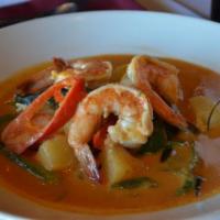 Panang Curry · Your choice of meat sauteed with pineapple chili peppers and basil in panang curry. Spicy.