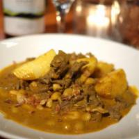 Yellow Curry · Your choice of meat sauteed with potato, white bean and basil in yellow curry.