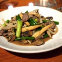 Num Mun Hoi · Your choice of meat sauteed with garlic, baby corn, mushrooms, white onions and scallops in ...