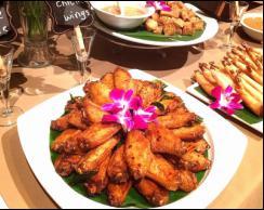 Spicy Chicken Wings · Deep-fried crispy chicken wings layered in fresh chili garlic and topped with crispy sweet b...