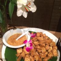 Crispy Tofu · Deep-fried tofu served with sweet and sour sauce and peanut sauce.