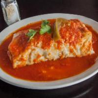 Burrito Suizo · Everything a burrito include topped and covered in melted cheese. Includes lettuce, tomato, ...