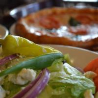 Greek Salad  · Tomatoes, Kalamata olives, feta cheese, pepperoncini, red onions, green bell peppers, cucumb...