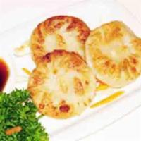 Oriental Chive Dumpling (3) · Pan-fried chive dumpling. Vegan.