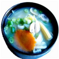 Veggies Miso Soup · Soy bean based soup with mixed veggies, tofu, scallion and seaweed. Gluten free.
