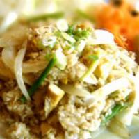 Fried Rice · White rice with egg, white onion and green onion.
