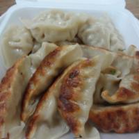 1. Pan Fried Dumplings · 15 pieces.