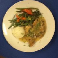 Chicken Francaise · Lightly battered chicken breast finished in a lemon white wine caper sauce. Served with mash...