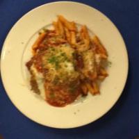 Eggplant Parmigiana Platter · Batter dipped and fried. Topped with tomato sauce and mozzarella cheese. Served with a side ...
