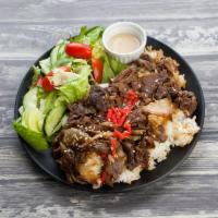 Beef Rice Bowl · Savory and juicy sliced beef served over steamed rice.