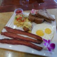 Traditional Breakfast Your Way · Choose from slices of our signature HoneyBaked Ham, sausage or brown sugar cured bacon with ...