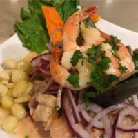 Mixto Ceviche · Mixed fresh seafood (shrimp, calamari, scallops, mussels, and fish) marinated with fresh lim...