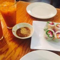A2. 2 Piece Vegetarian Summer Rolls · Refreshing rolls wrapped in rice paper with fried tofu, pickle, carrot, daikon, lettuce and ...