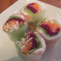 A3. 2 Piece Shrimp Summer Rolls · Refreshing rolls wrapped in rice paper with cooked shrimp, pickle, carrot, daikon, lettuce a...