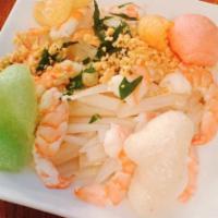 A9. Lotus Root Salad · Pickled lotus, roots, dressed with lime sauce and topped with steamed shrimp.