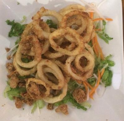 A14. Fried Calamari · Lightly battered calamari rings fried to golden brown, served with sweet chili sauce.