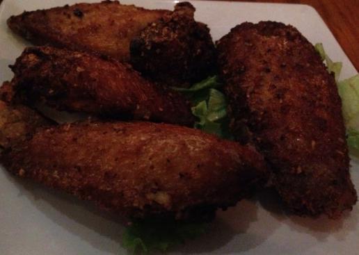A21. 4 Piece Fried Chicken Wings with Garlic and Fish Sauce · 