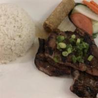 R2. Grilled Pork Chop on Rice · Charbroiled marinated pork chops. Served with steam rice.