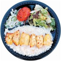 10. Chicken Breast Kabob · Marinated chunks of chicken breast served with basmati rice, green salad, broiled tomato, sl...