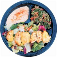 27. Chicken Breast Salad · Chunks of chicken breast over a bed of mixed lettuce, with hummus and tabbouleh.