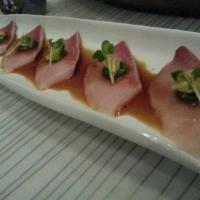 Hamachi Carpaccio · Sliced of yellowtail with jalapeno and house sauce.