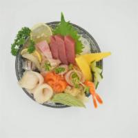 Chirashi · Assortment sashimi over sushi rice.