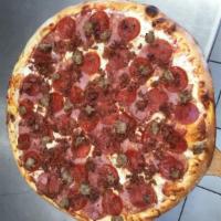 Carnivore Pizza · Marinara sauce, mozzarella cheese, Canadian bacon, salami, pepperoni, bacon and Italian saus...