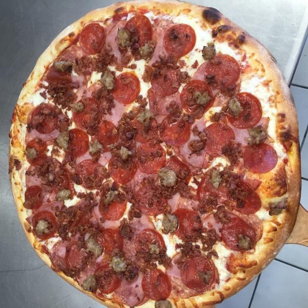 Carnivore Pizza · Marinara sauce, mozzarella cheese, Canadian bacon, salami, pepperoni, bacon and Italian sausage. All pizza crusts are brushed with butter sauce.
