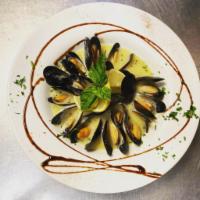 Sautéed Mussels · With Red Marinara Sauce or Lemon Butter White Sauce.