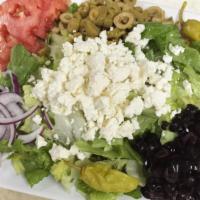 Greek Salad · Romaine, red onions, black & green olives, tomatoes, feta cheese.