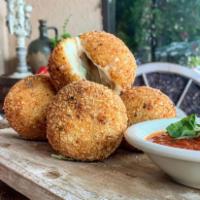 Arancini di Riso · Sicilian rice balls with peas and ground beef in your choice of vodka or marinara sauce. Add...