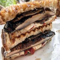 S5. Grilled Portobello Mushrooms Panini · Fresh mozzarella cheese and sun-dried tomatoes.