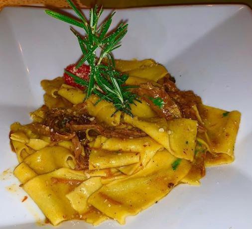 Tagliatelle alla Bolognese · Handmade green fettuccine served with our traditional Bolognese sauce.