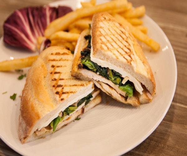 Grilled Chicken Panini · Grilled chicken with roasted peppers and fresh mozzarella cheese.