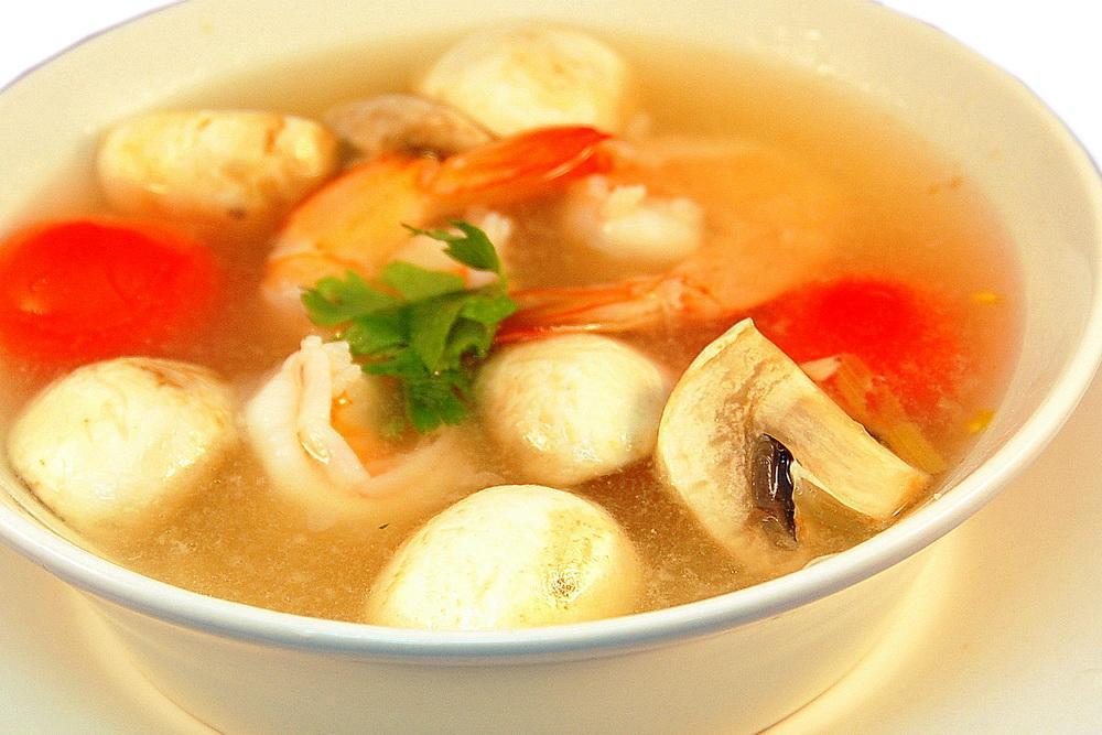 Tom Yum Goong Soup · Shrimp, tomato and mushroom in lemongrass soup with kaffir leaves and galanga. Mildly spicy.