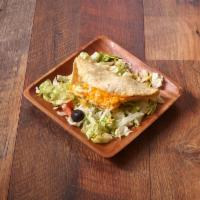 Taco a la Carte · Crisp corn tortillas, each folded to hold your choice of filling, garnished with cheese, fre...