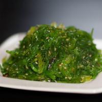 Seaweed Salad · With radish in light vinaigrette.