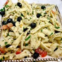 Pasta Salad · Fresh pasta mixed with baby spinach, oregano and feta cheese topped with black olives.
