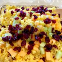 Couscous Salad · Couscous mixed with baby spinach, dried cranberries, pineapple, and shredded carrots.
