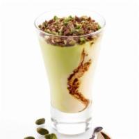 Coppa Pistachio · Custard gelato swirled with chocolate and pistachio gelato topped with praline pistachios.

